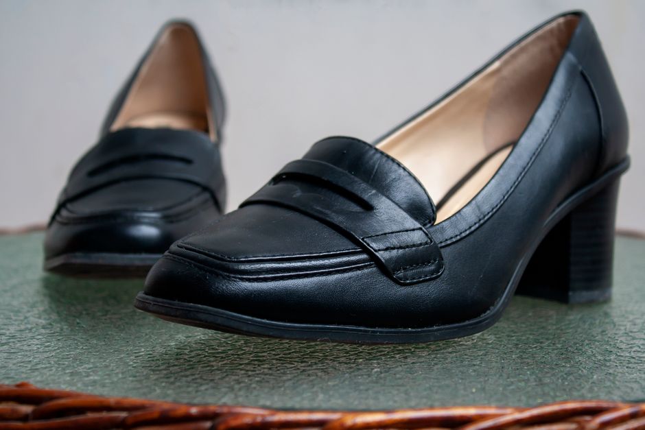 Close-up of stylish black leather women's loafers, perfect for fashion-forward styling